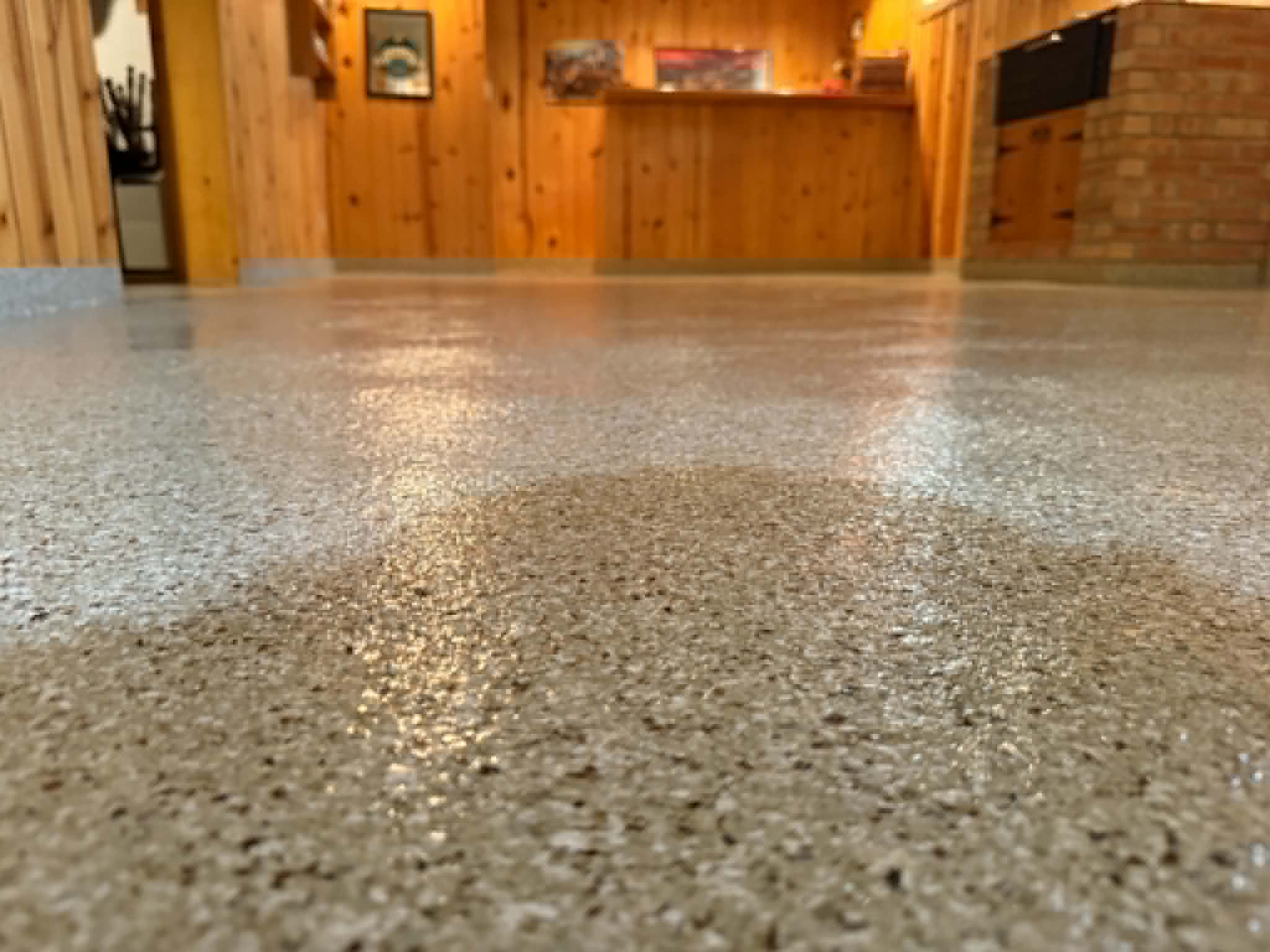Residential basement floor with seamless epoxy coating in a Wisconsin home
